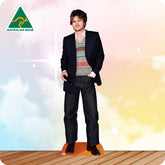 Cardboard cutout of a person wearing a suit and patterned sweater with 'Australian Made' logo.